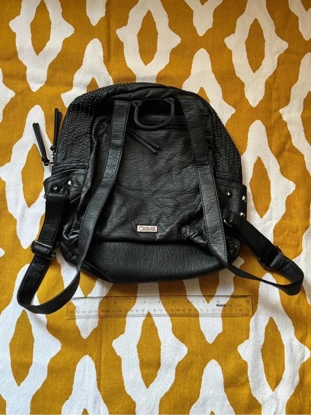 Carlos by Carlos Santana black faux